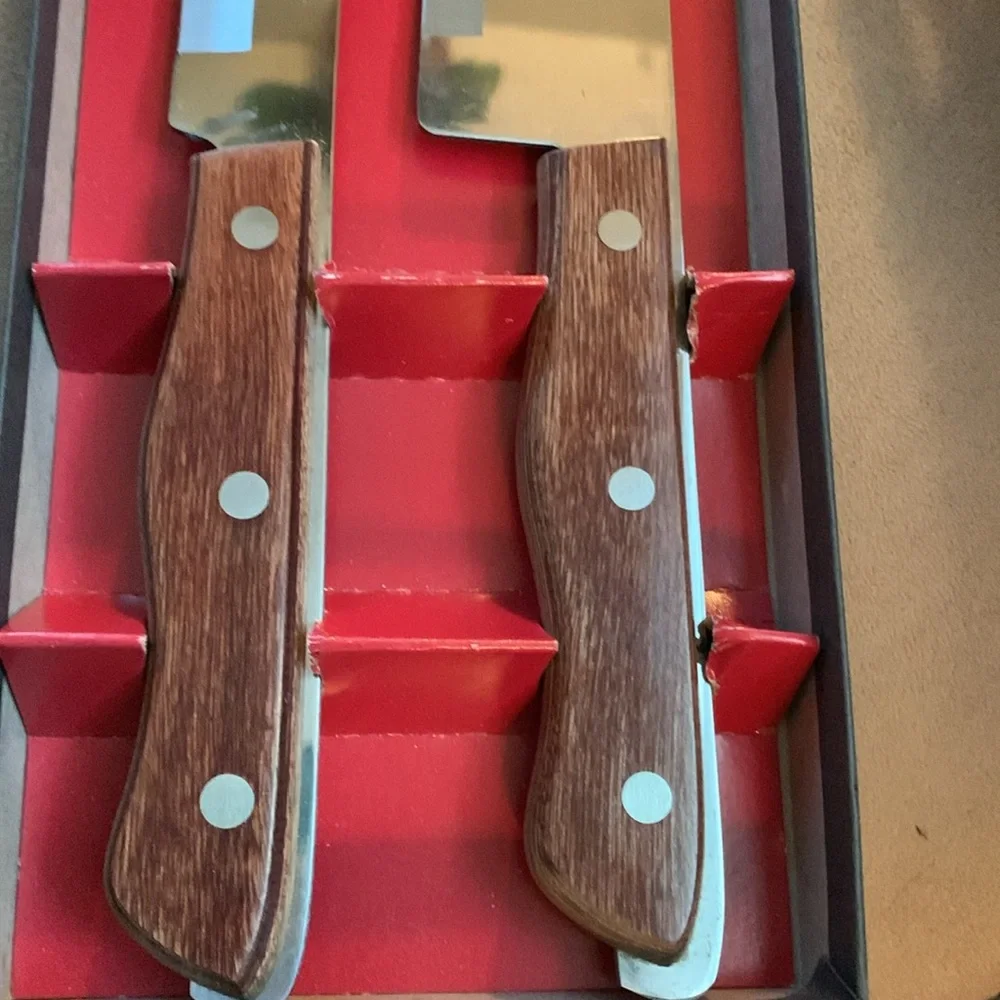 Set of Maxam carving knives in original box, blades approximately 6” & 8”